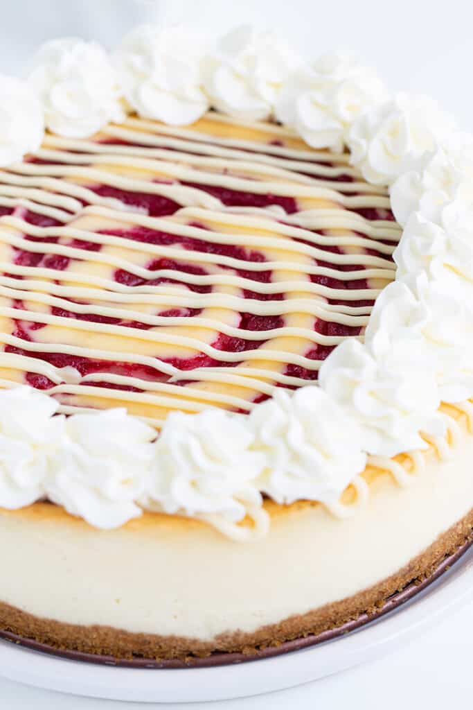 whole cheesecake on a white plate