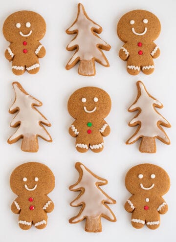 gingerbread cookies layed out on a white surface