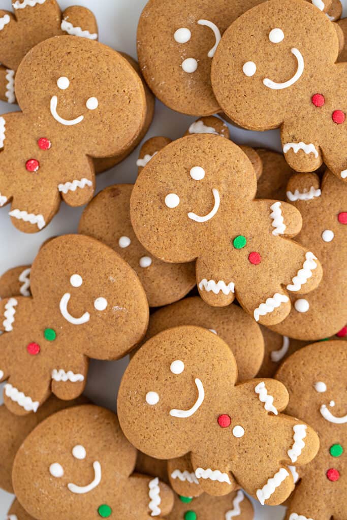 overhead photo of stacked decorated gingerbread cookies