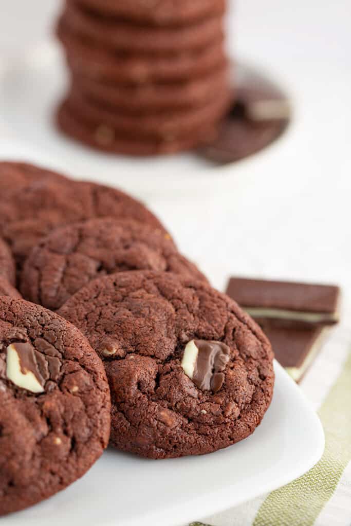 platter of cookies with some andes mints beside it and a stack of cookies in the background