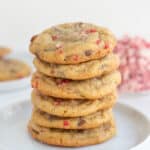 stack of chocolate chip cookies on a white plate