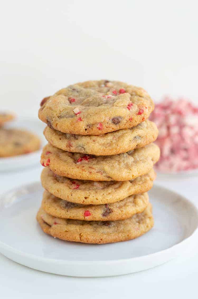 stack of chocolate chip cookies on a white plate