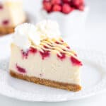 A slice of cranberry cheesecake on a plate.