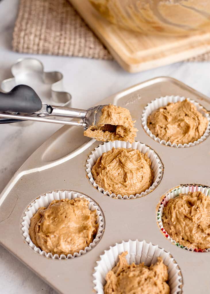 muffin batter in a muffin tin