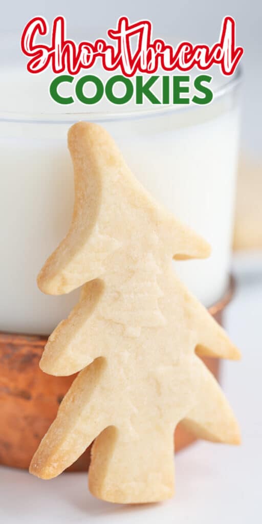 zoomed in photo of a tree shortbread cookie with a glass of milk behind it and the recipe name at the top