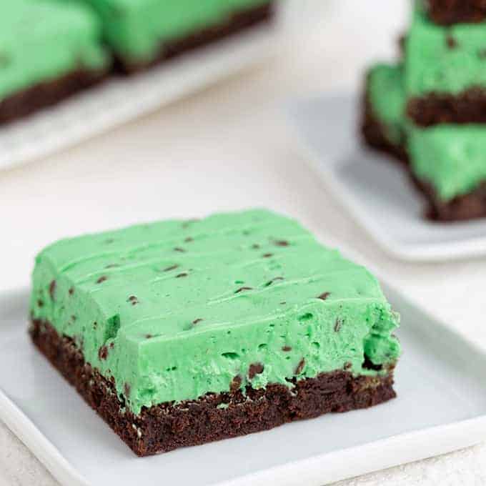 square image of a single brownie on a white plate