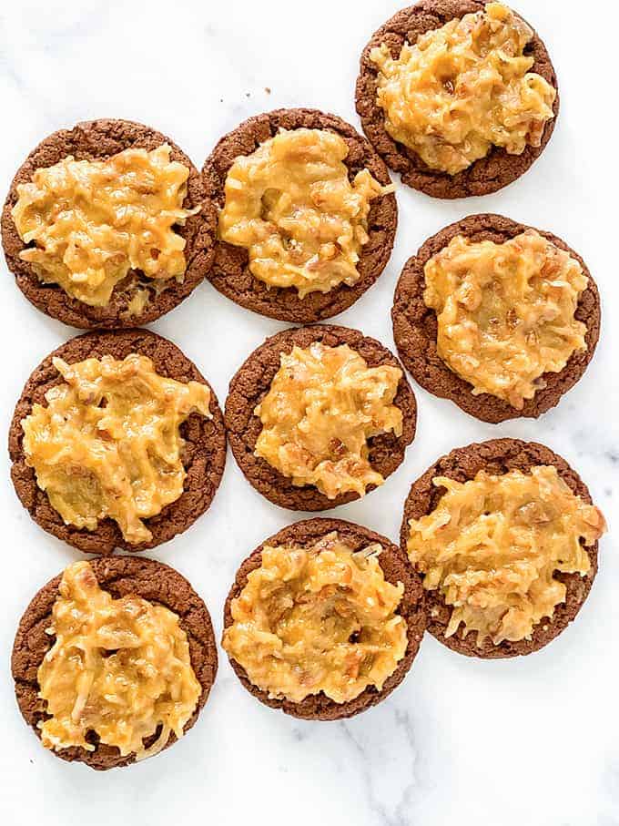 overhead photo of german chocolate cookies on a marble background