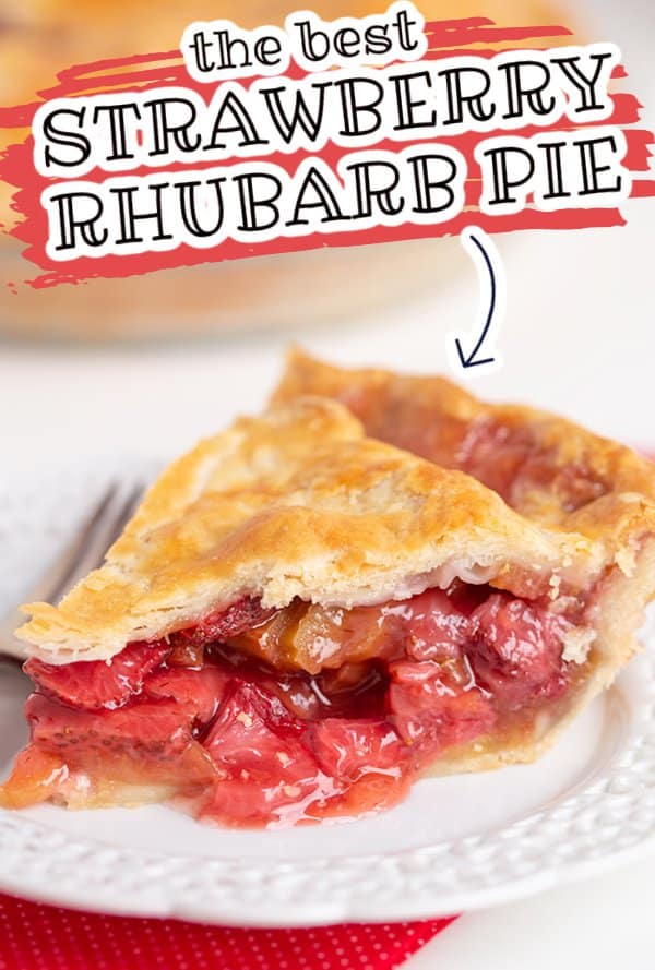 close up of a slice of strawberry rhubarb pie on a white lace plate with a red linen under it