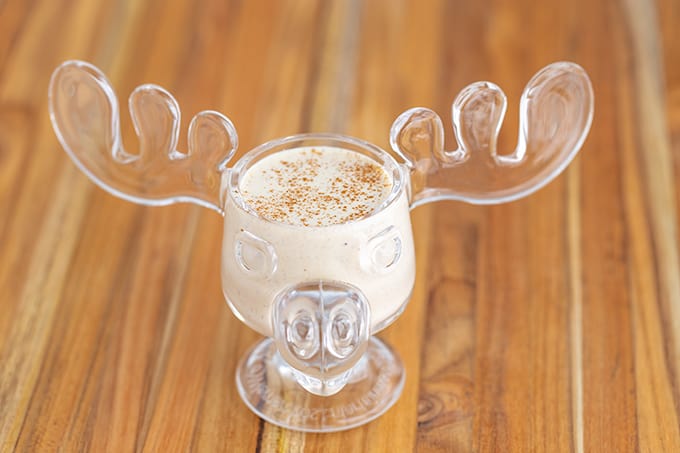 eggnog in a moose cup on wood