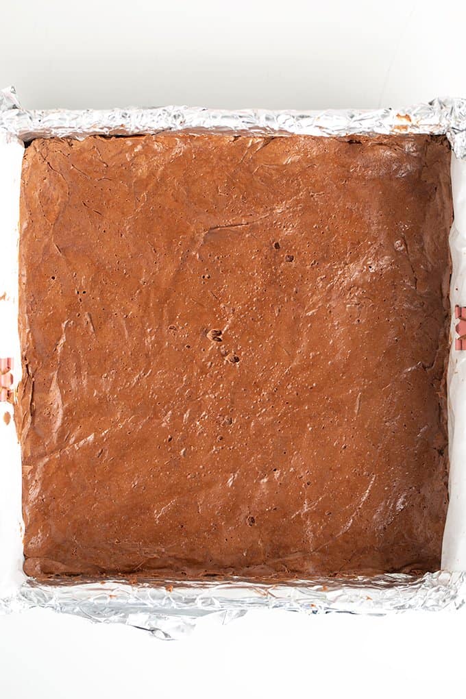 overhead image of the mixture pressed into the prepared pan.