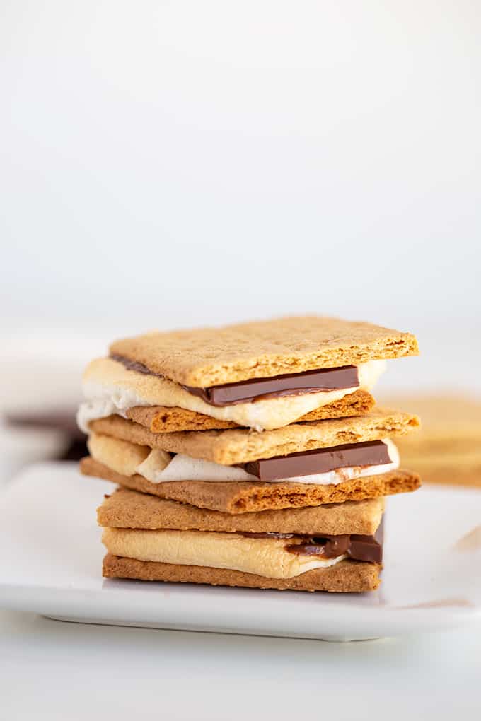 stack of smores on a white plate