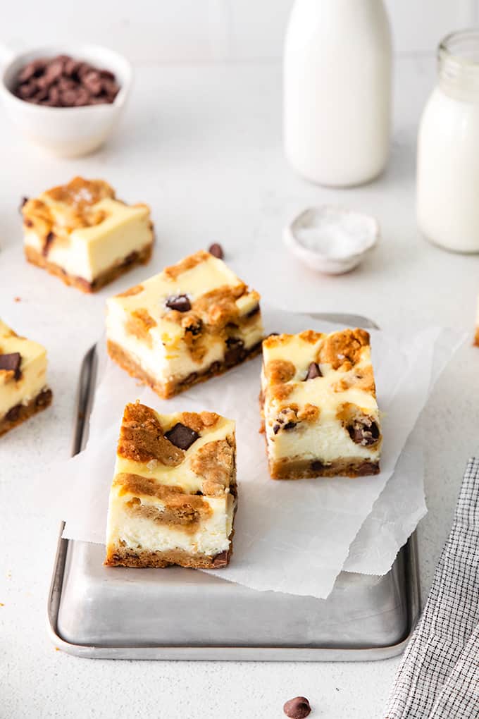 picture showing the cheesecake bars on a piece of parchment paper