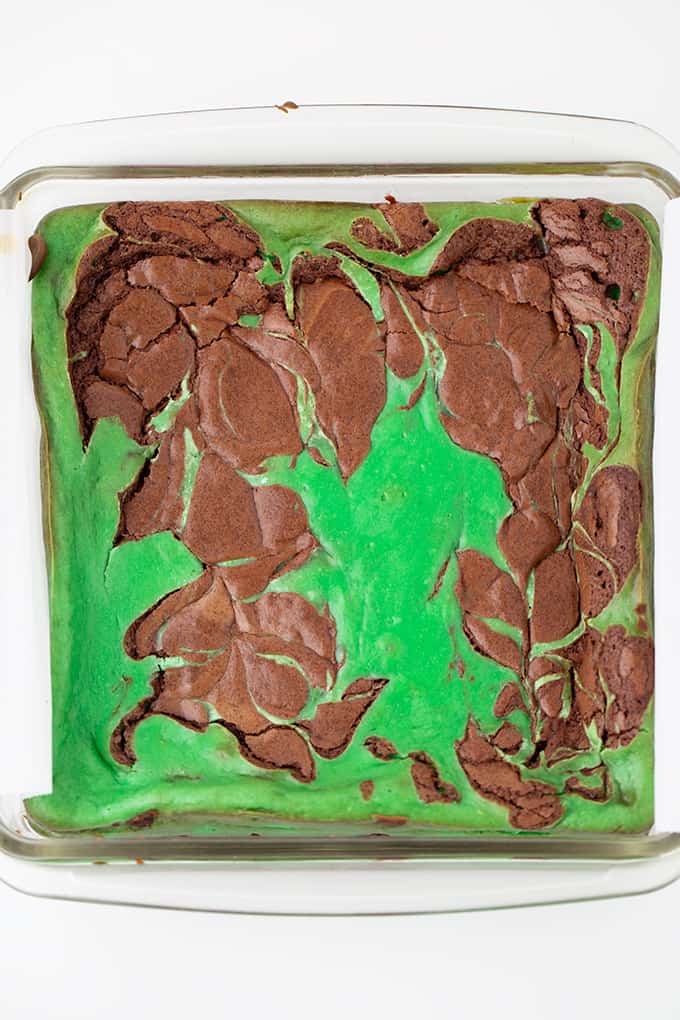 glass pan of brownies showing the swirls on a white surface