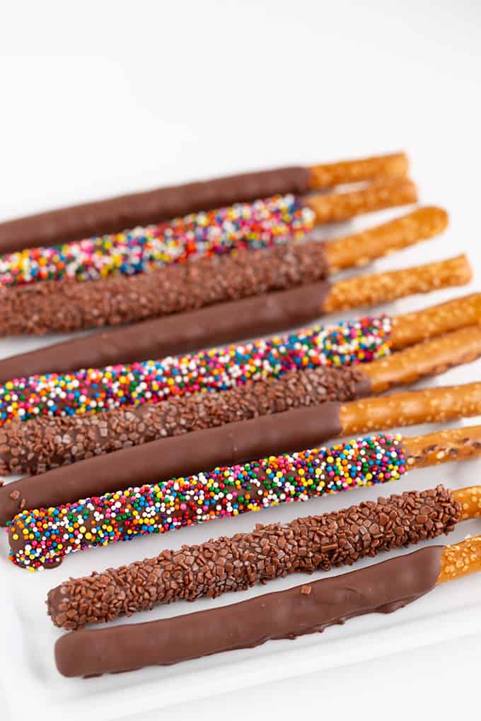 Chocolate Pretzels on a white plate on a white surface