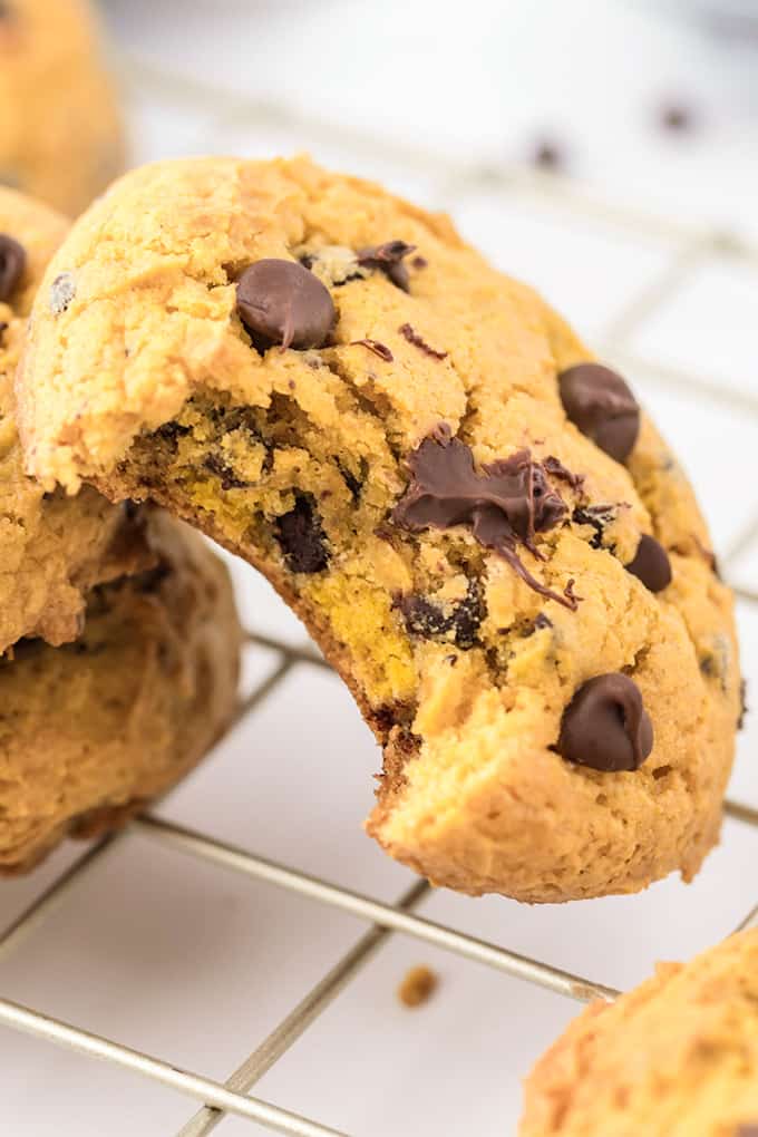 Close-up of a bite out of a cream cheese chocolate chip cookie