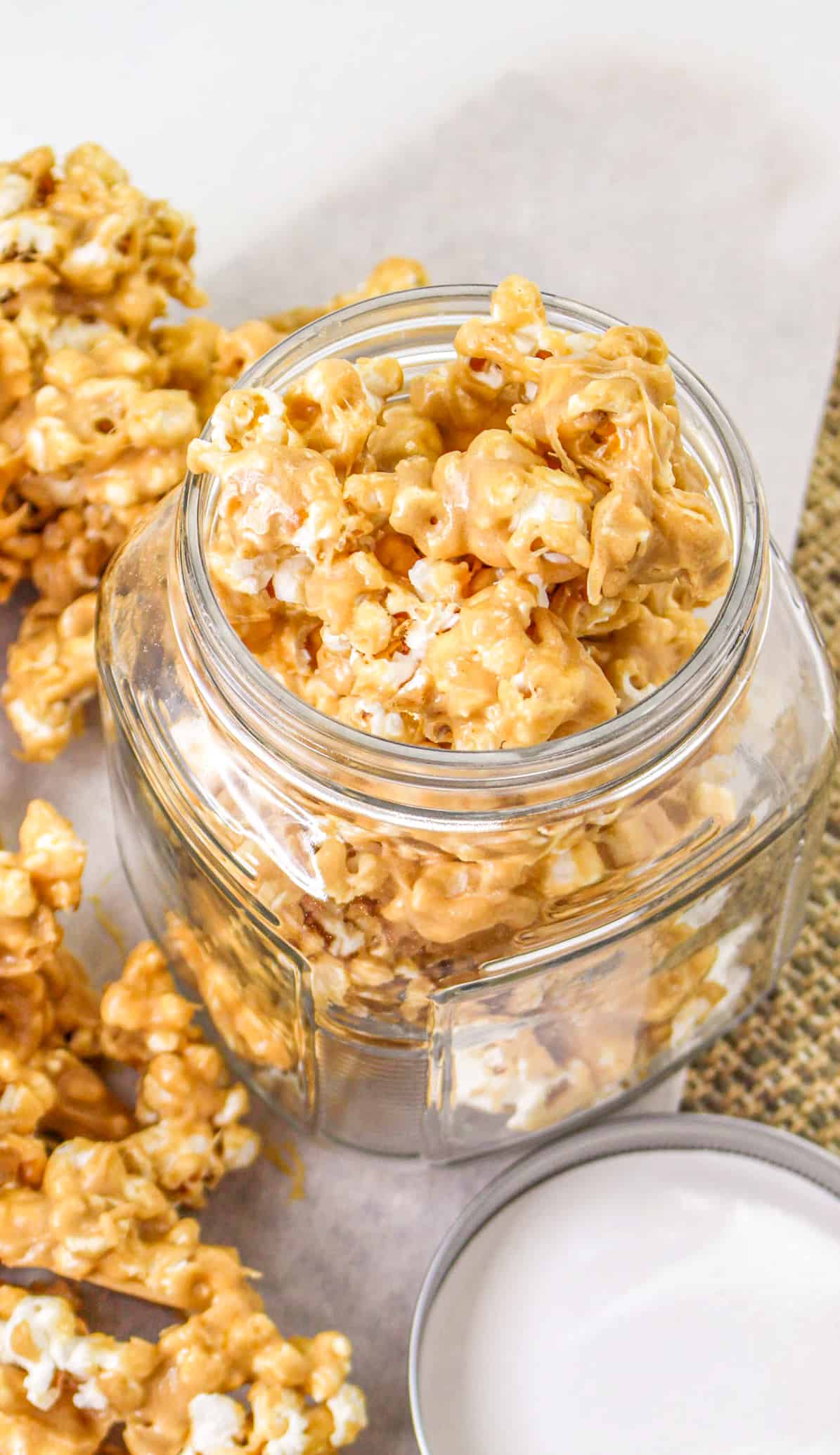 Peanut Butter Popcorn in a glass jar.