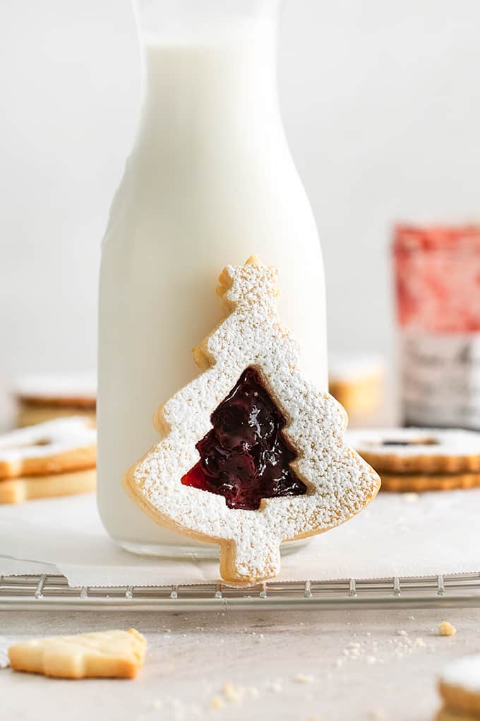 Front view of vertical Christmas Linzer Cookie.