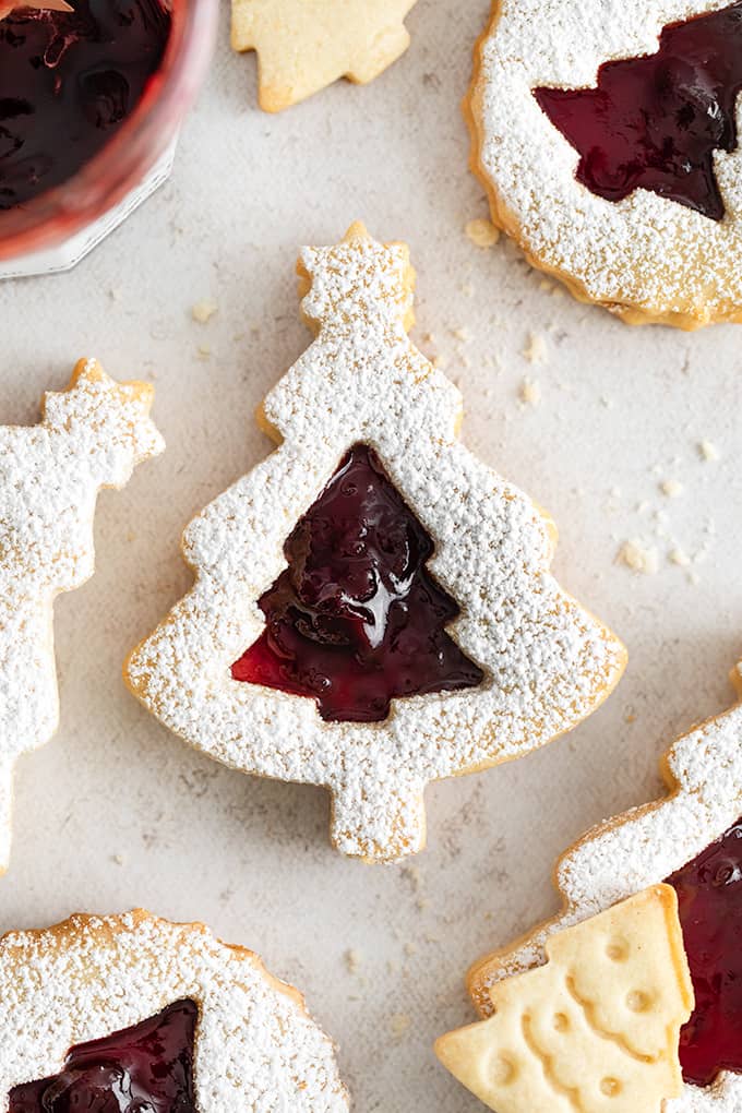 Close-up top down view of a Christmas Tree Shaped Classic Linzer Cookie.