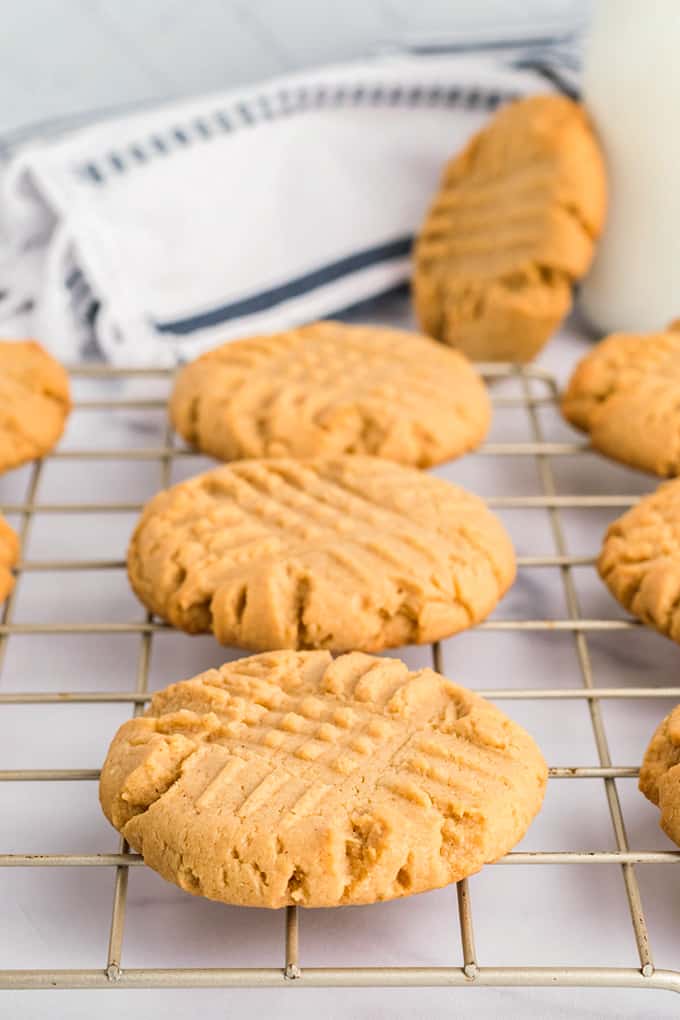 close up view of cake mix peanut butter cookies on a cooling rack.