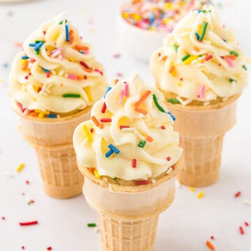 Ice cream cones with sprinkles on top are transformed into delightful cupcake-shaped treats.