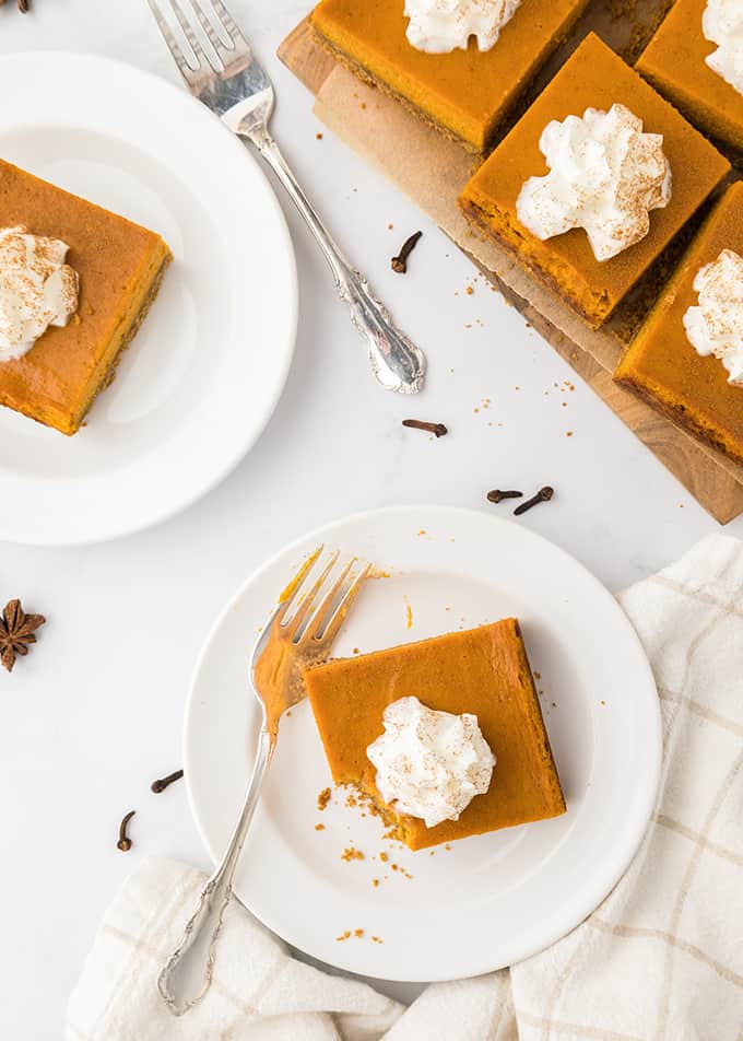 Pumpkin bars on a white plate.